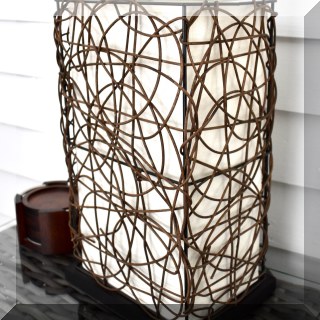 D31. Wicker and cloth uplight table lamp 14”h - $28